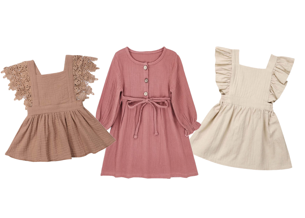 Three warm neutral color baby girl dresses